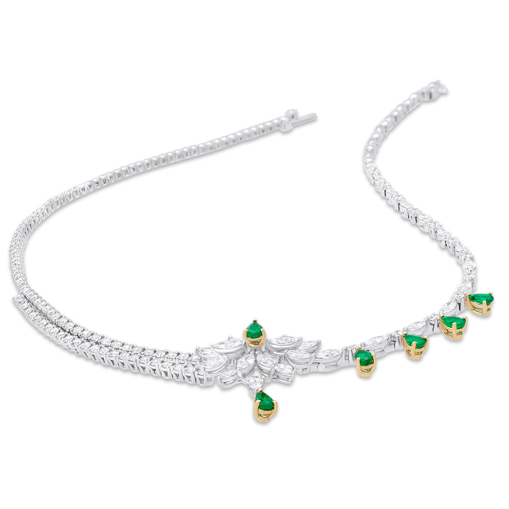 
                  
                    Asymetric Necklace with white Diamonds and Pear-Shaped Emeralds
                  
                