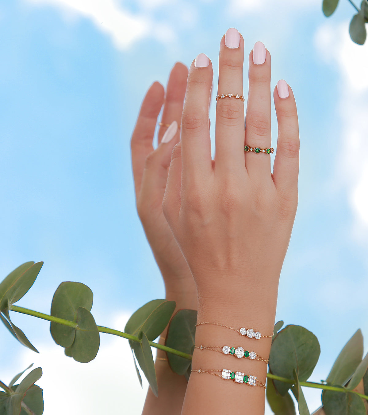 
                  
                    All-around Stackable Diamond and Emerald Ring
                  
                