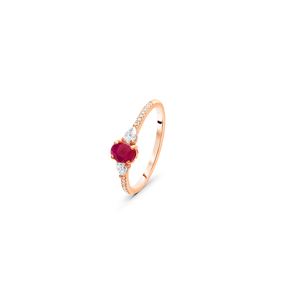 Dainty Oval Ruby Ring with Pear Diamond Side Stones